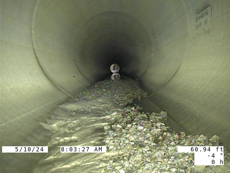 CCTV camera inspection of underground stormwater pipe to identify cracks, joint failure, and blockages.