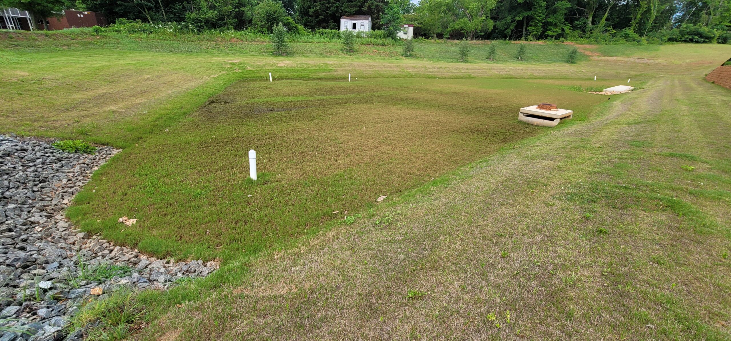 Annual stormwater inspection of detention basin and storm drain system for permit compliance.